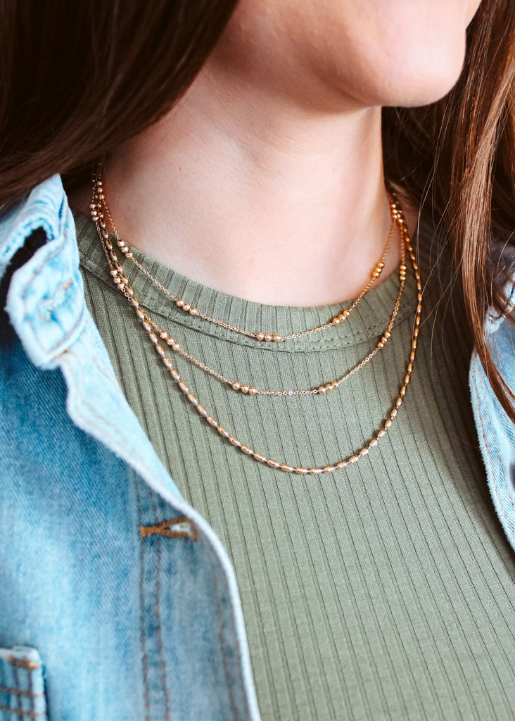 Gold thin chain with triple layered necklace