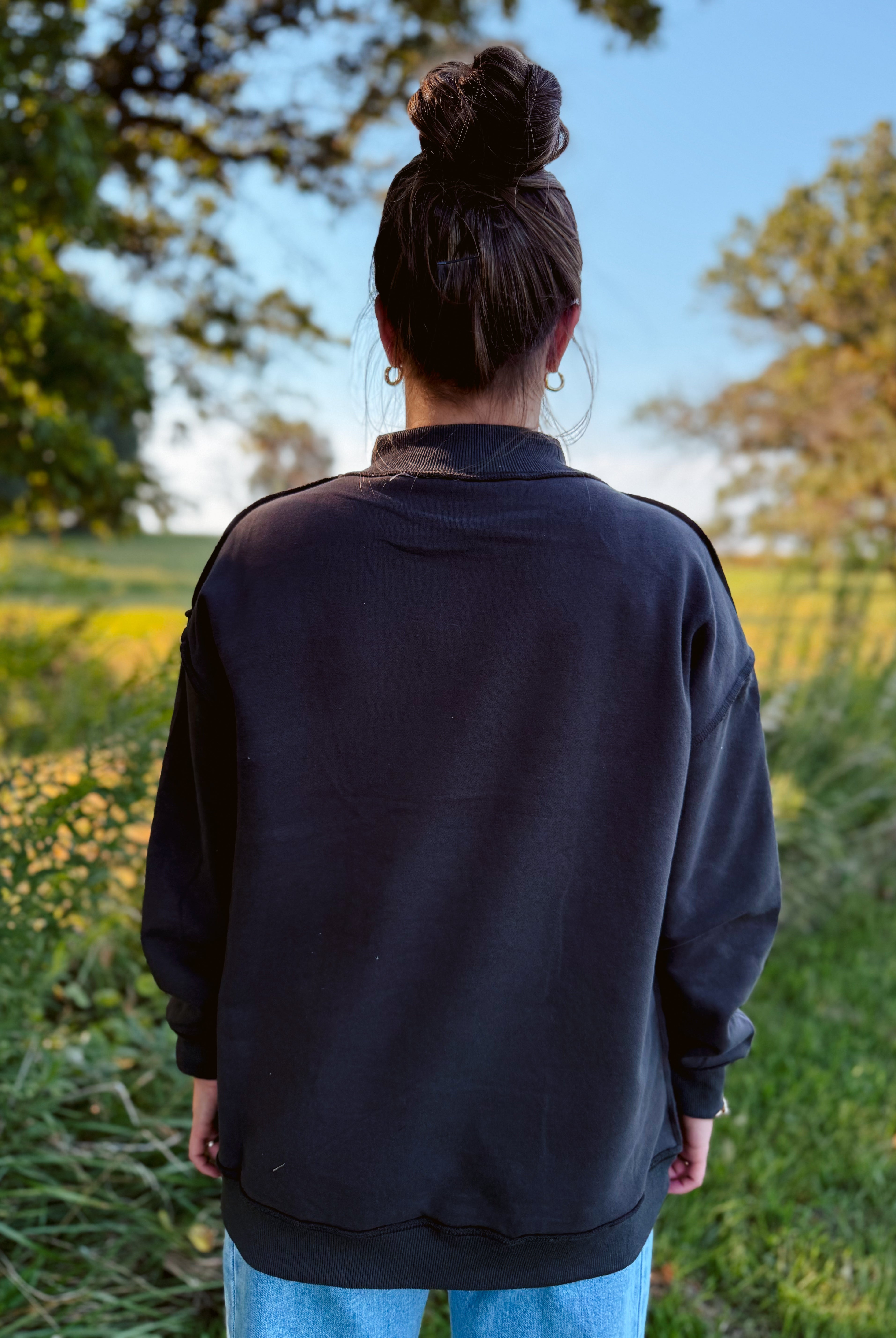 Happiness Trails Boutique - reversible Game Day sweatshirt! Featuring “Game Day” printed on one side and “Sunday Funday” on the reverse, this dark gray sweatshirt