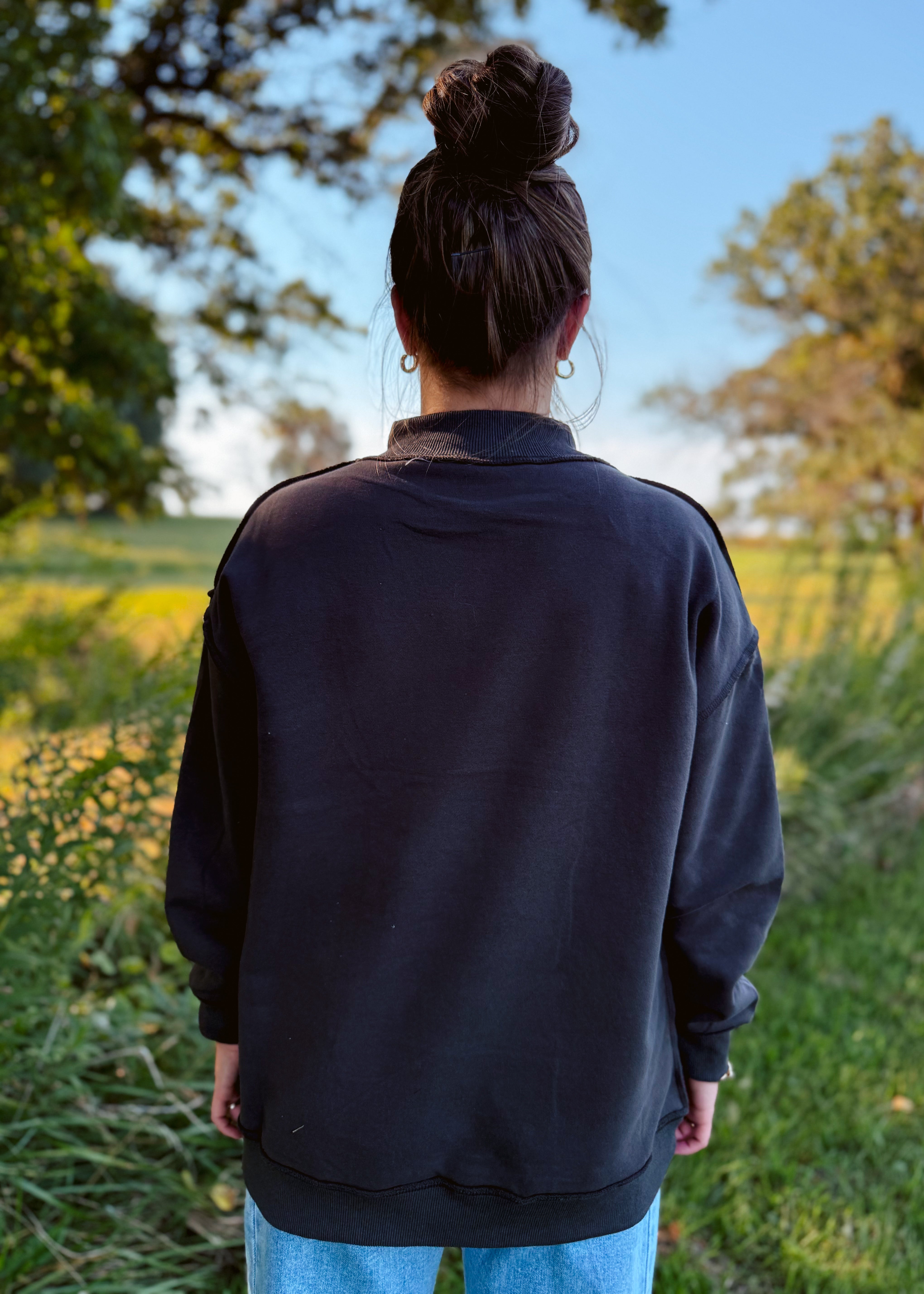 Happiness Trails Boutique - reversible Game Day sweatshirt! Featuring “Game Day” printed on one side and “Sunday Funday” on the reverse, this dark gray sweatshirt