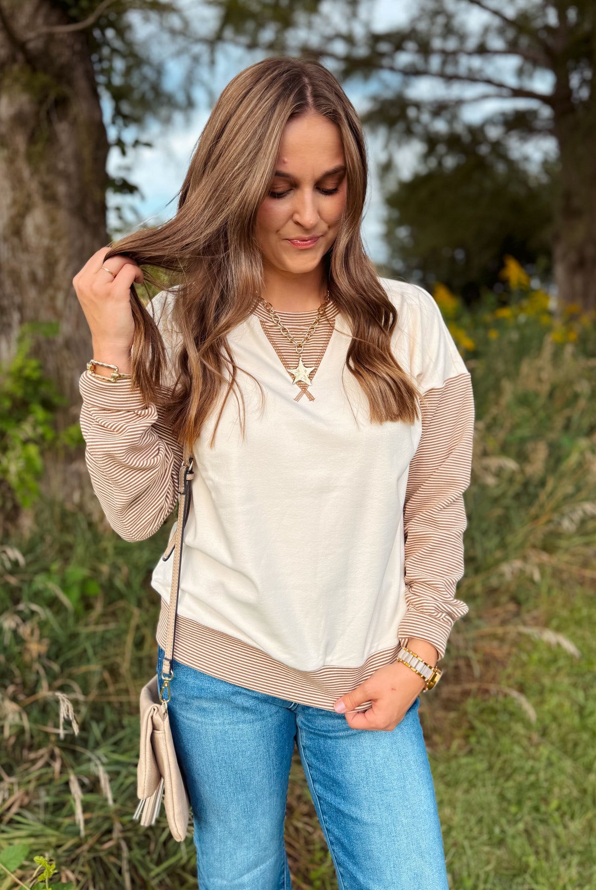Happiness Trails Boutique - Ivory sweatshirt with camel stripe detailing on the sleeves and waistband