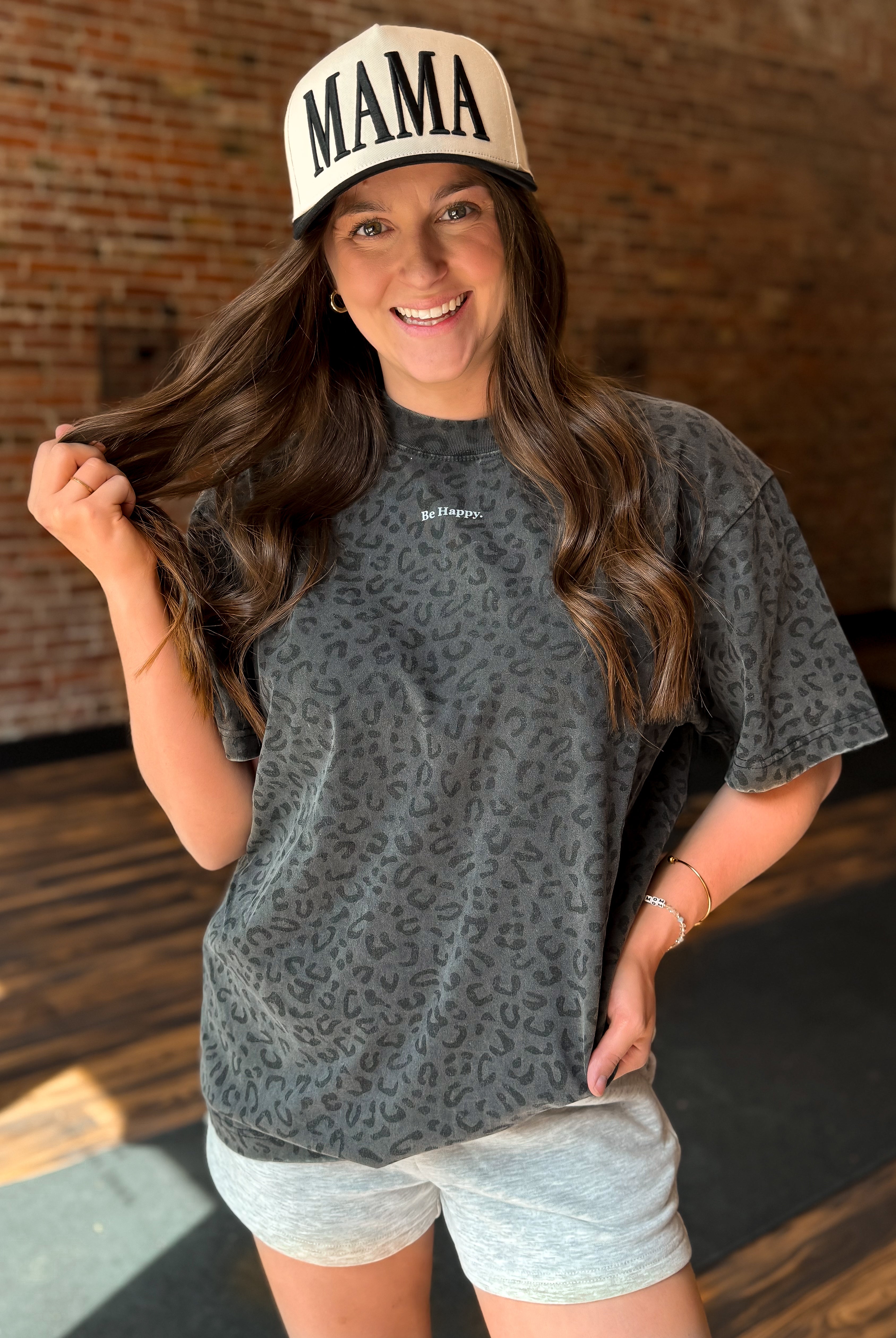 Happiness Trails Boutique - vintage black leopard graphic tee features “Be Happy” screen print