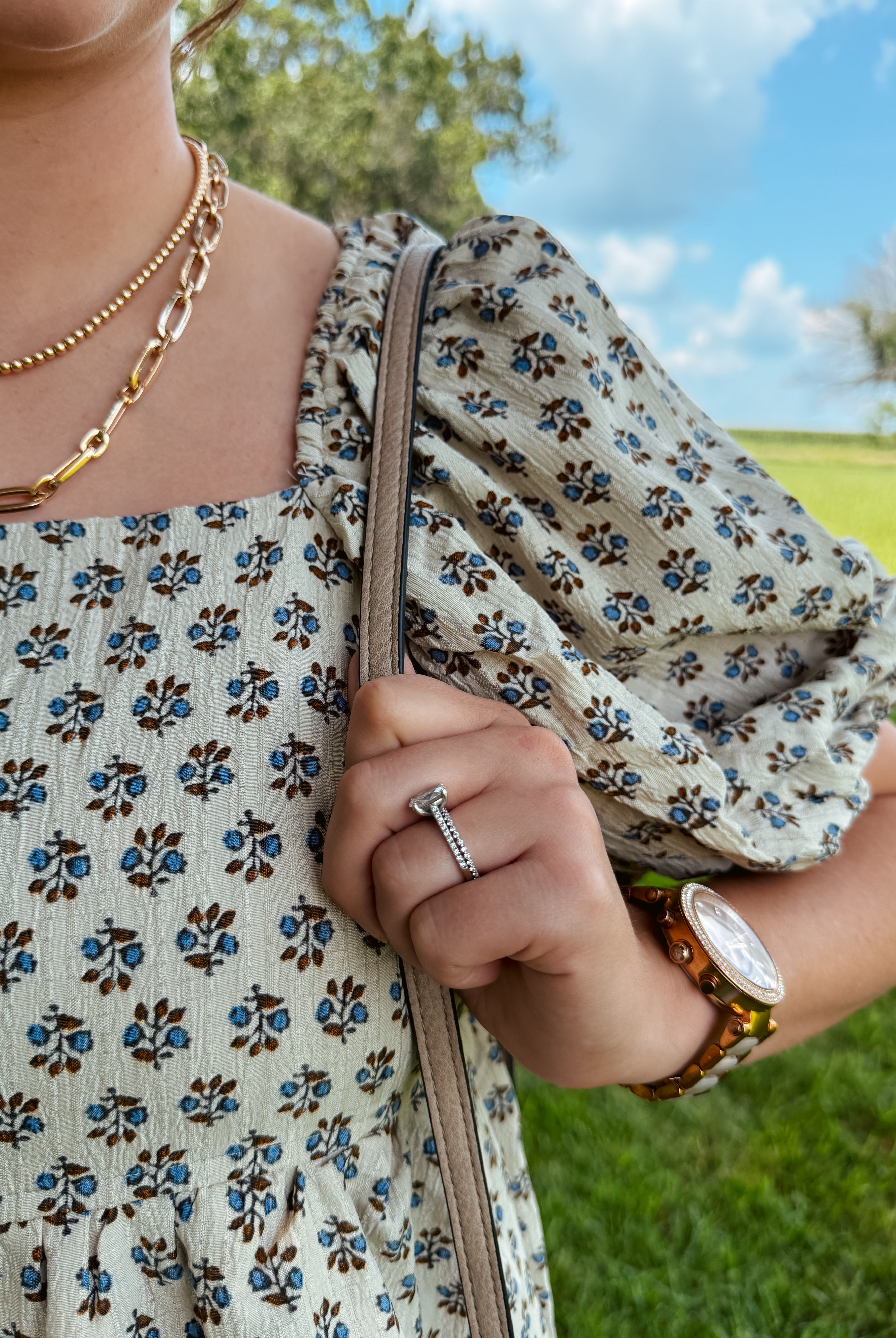 Happiness Trails Boutique - A soft neutral oatmeal tone beautifully complemented by blue floral accents dress