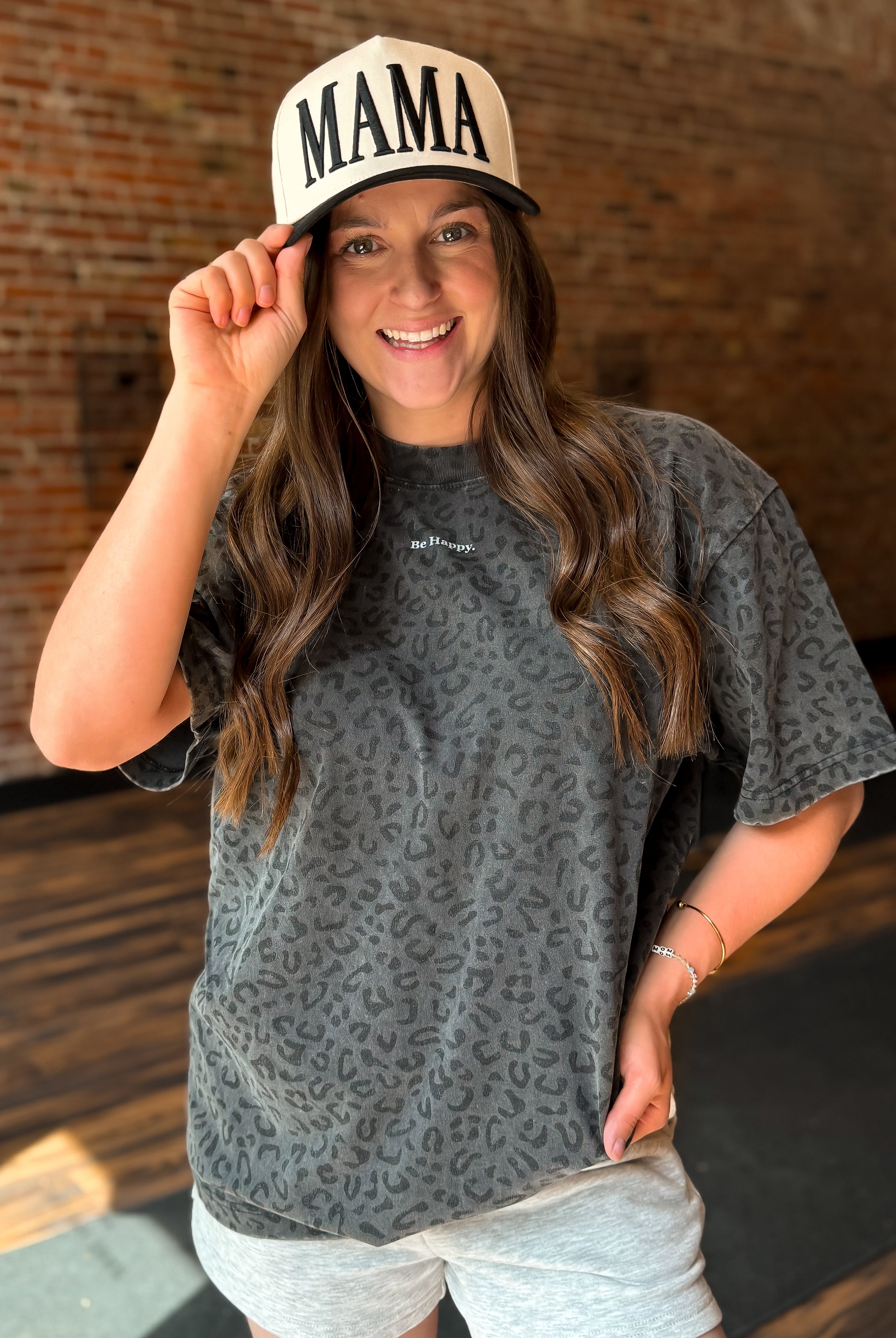 Happiness Trails Boutique - vintage black leopard graphic tee features “Be Happy” screen print