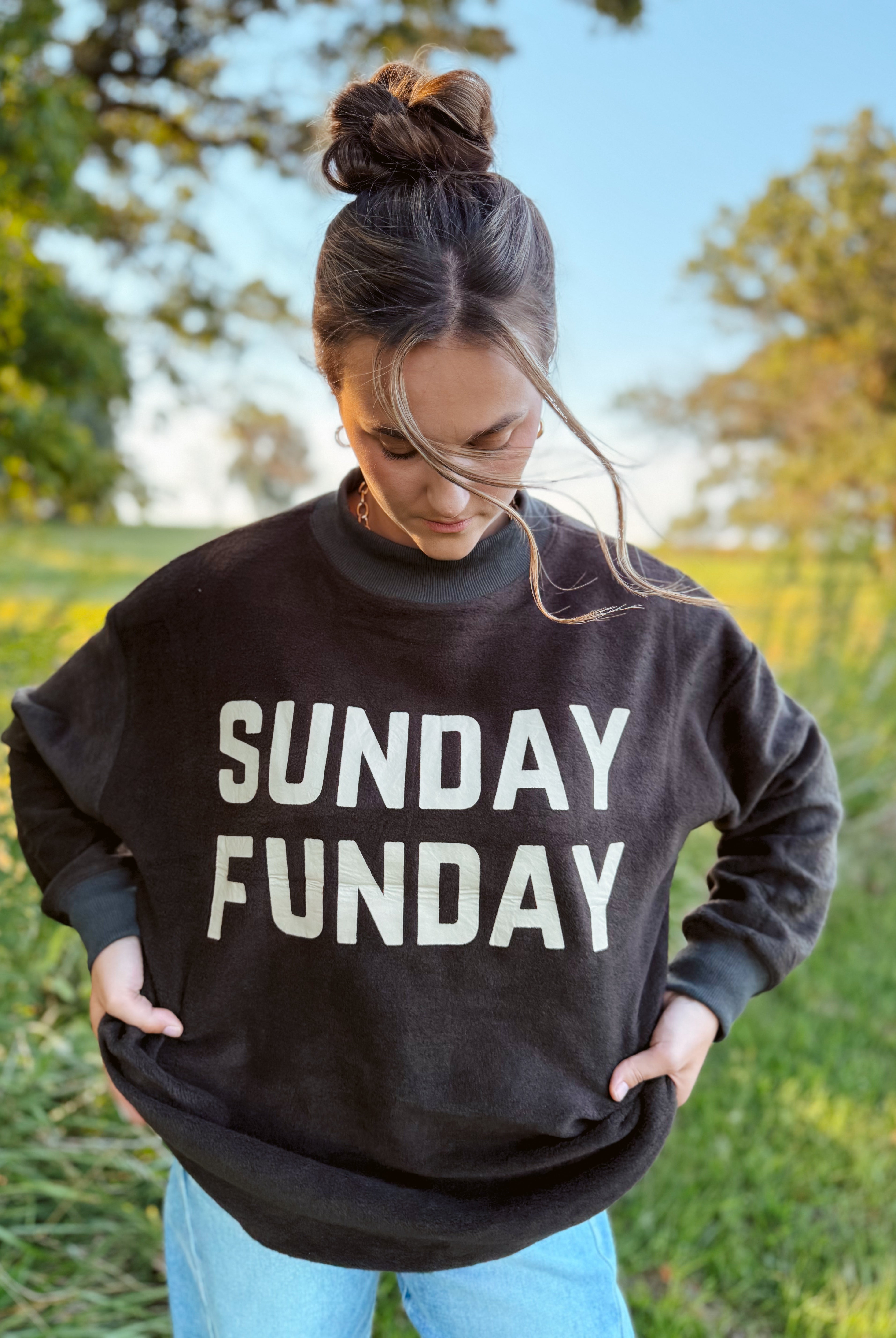 Happiness Trails Boutique - reversible Game Day sweatshirt! Featuring “Game Day” printed on one side and “Sunday Funday” on the reverse, this dark gray sweatshirt