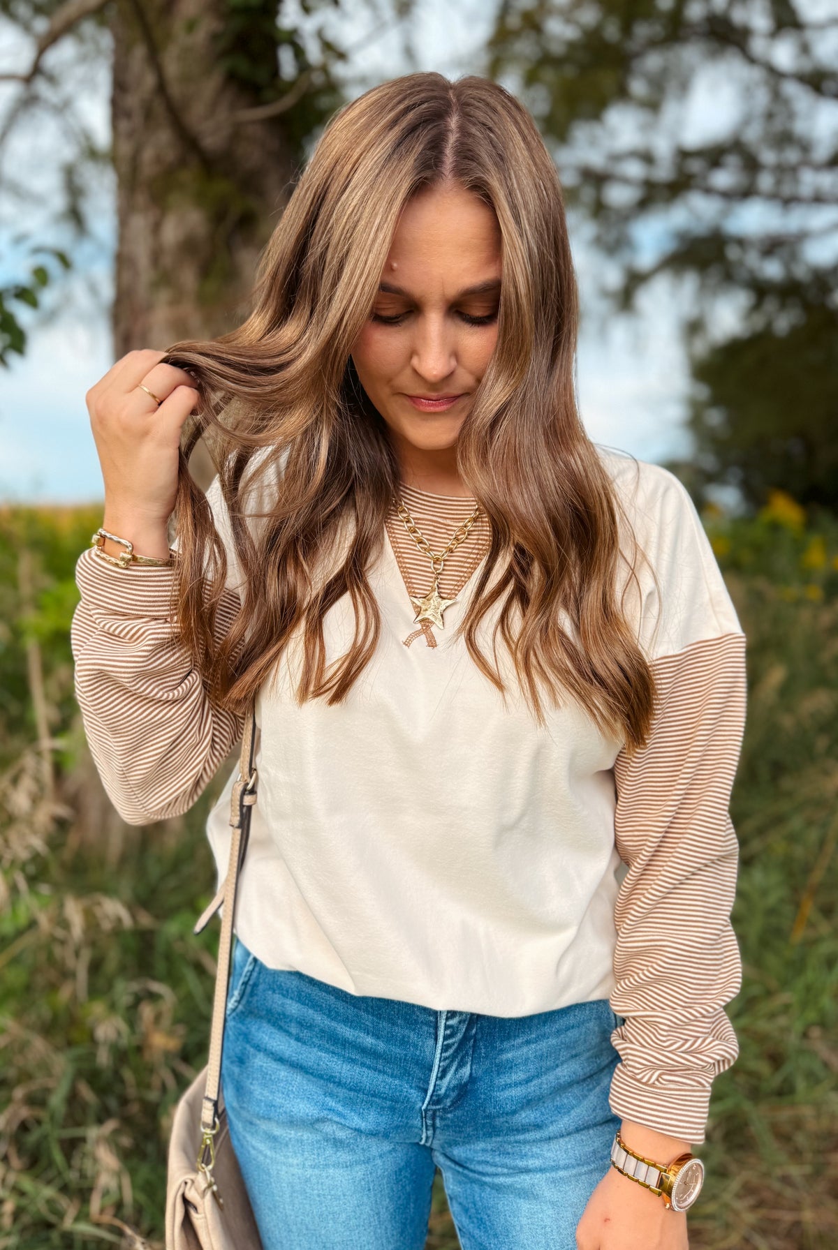 Happiness Trails Boutique - Ivory sweatshirt with camel stripe detailing on the sleeves and waistband