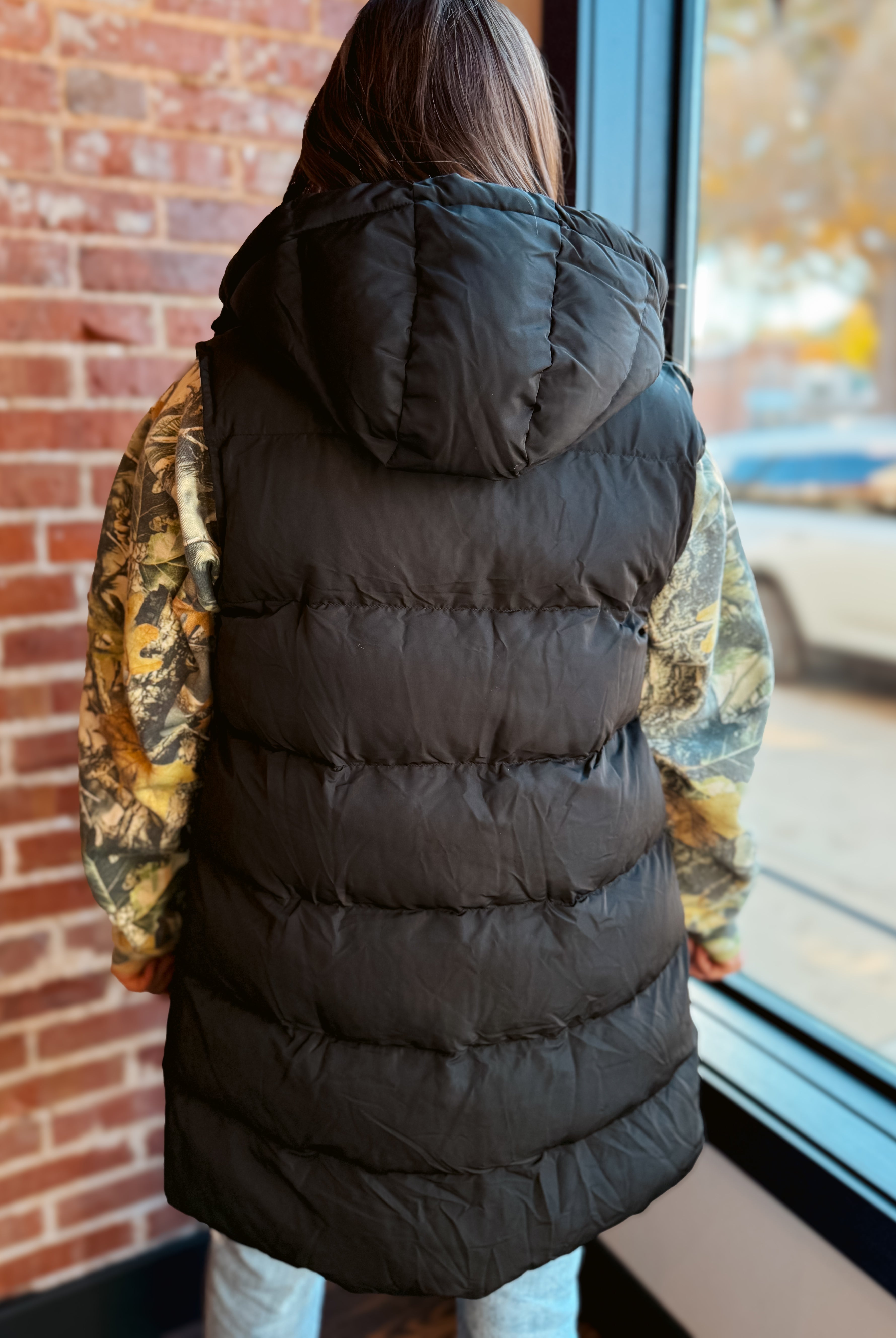Happiness Trails Boutique - Black hooded long puffer vest