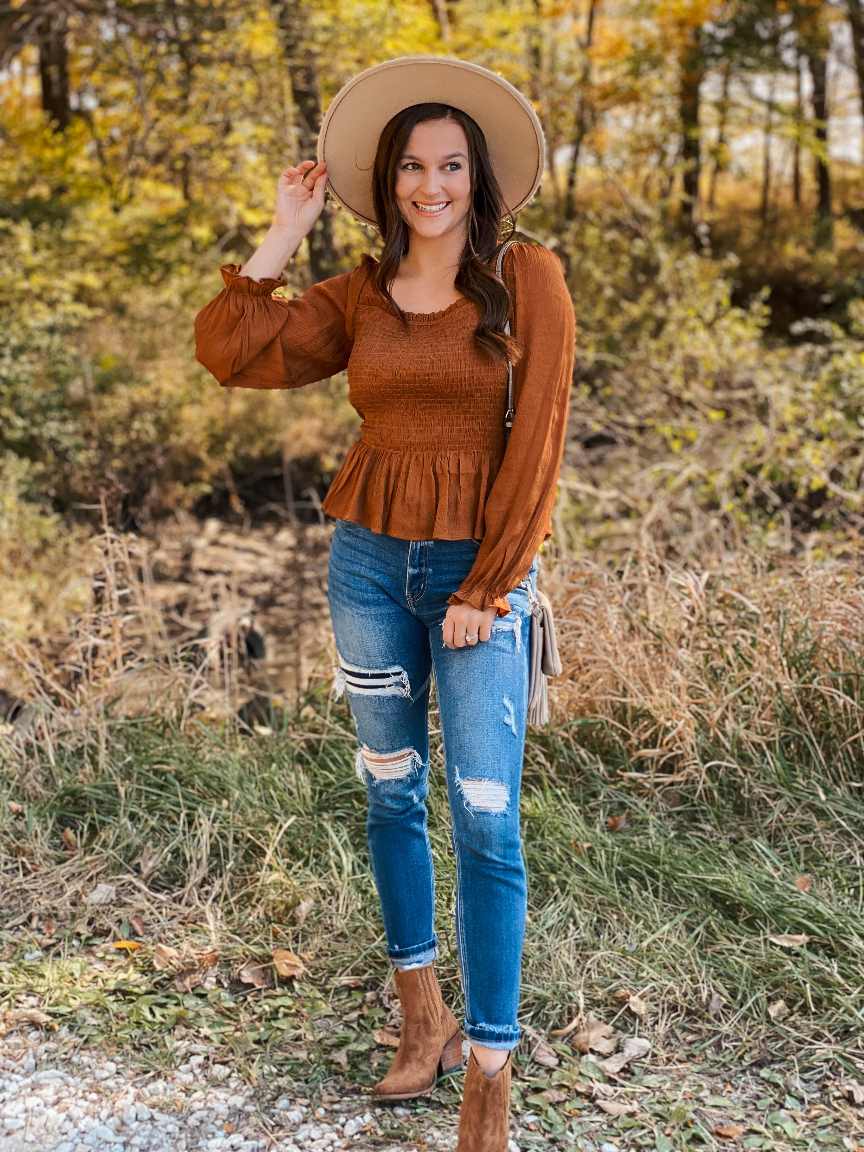 This smocked peplum top is adorable in the camel color.