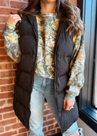 Happiness Trails Boutique - Black hooded long puffer vest