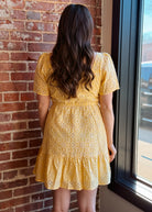 Happiness Trails Boutique - Yellow eyelet mini dress