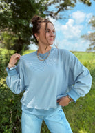 Happiness Trails Boutique - Ivory/blue striped sweatshirt