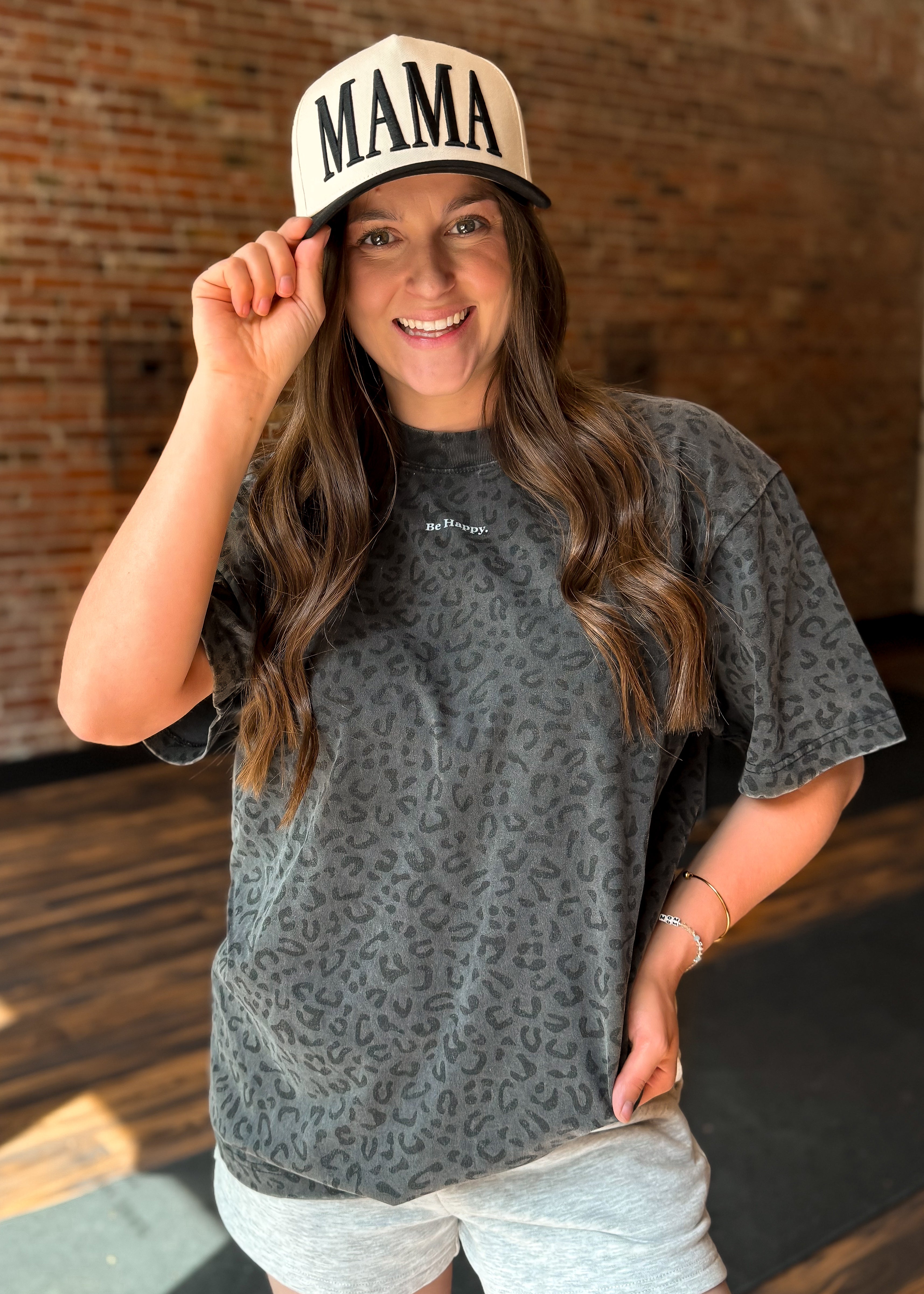 Happiness Trails Boutique -  vintage black leopard graphic tee features “Be Happy” screen print