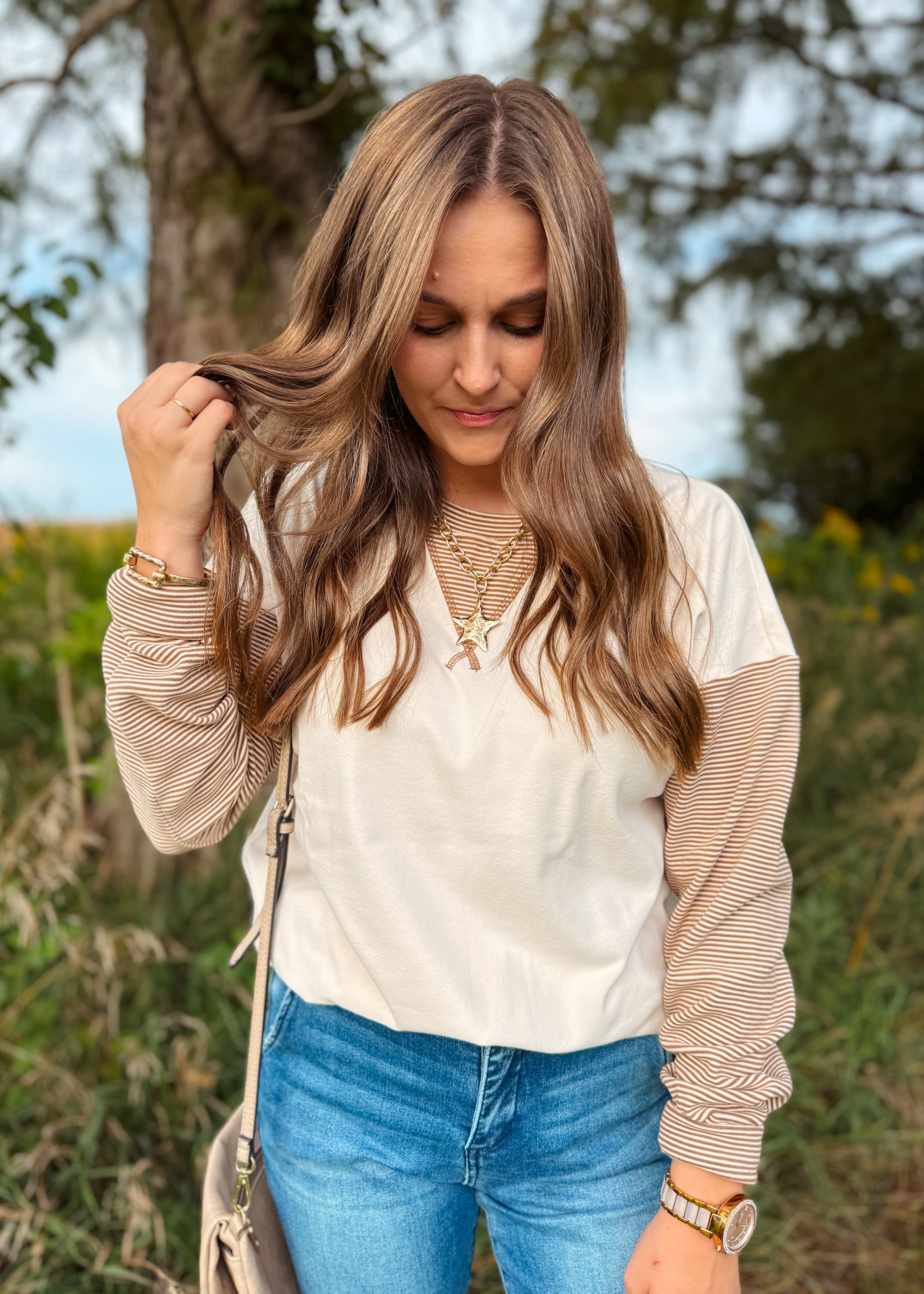 Happiness Trails Boutique - Ivory sweatshirt with camel stripe detailing on the sleeves and waistband