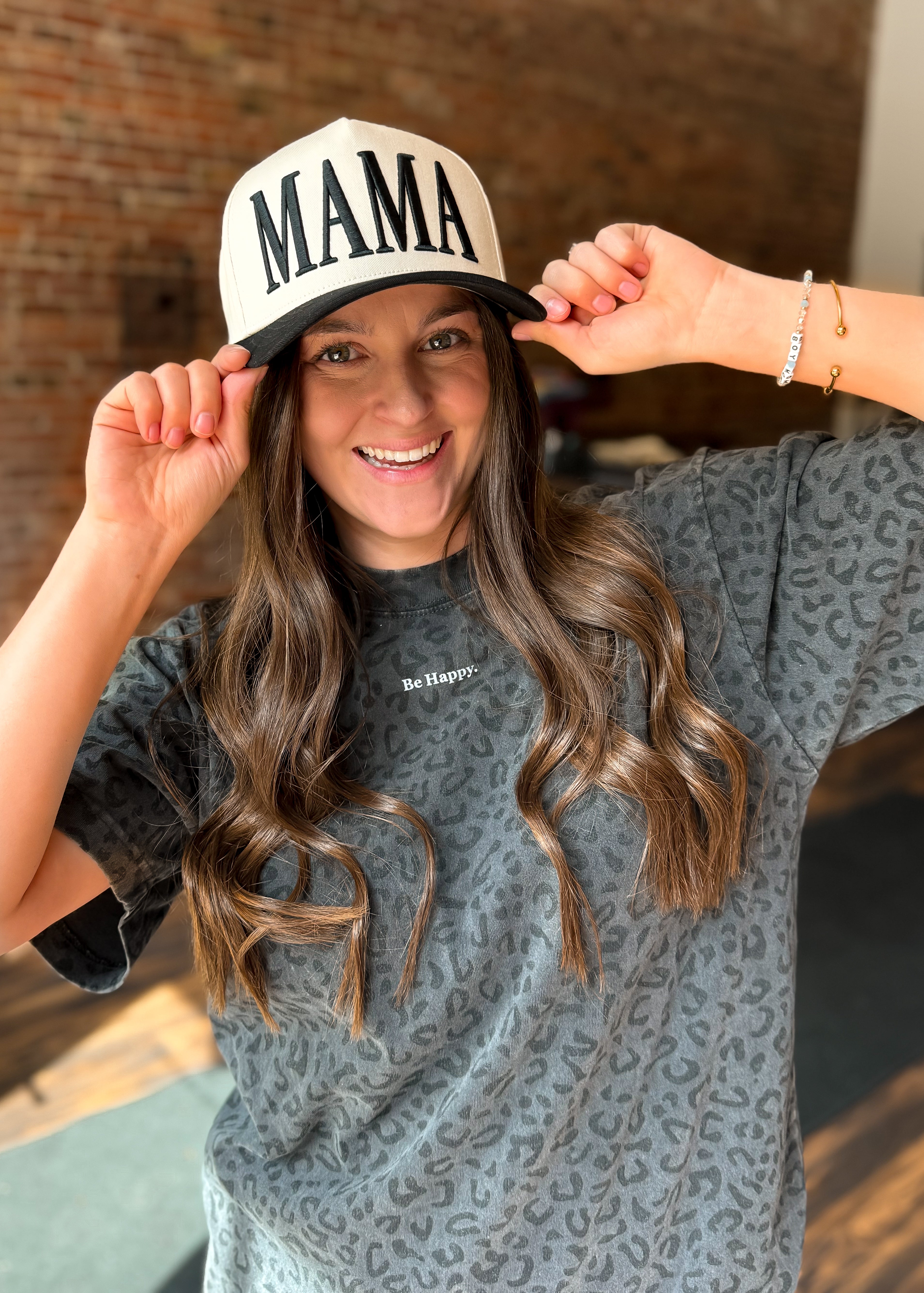 Happiness Trails Boutique -  vintage black leopard graphic tee features “Be Happy” screen print
