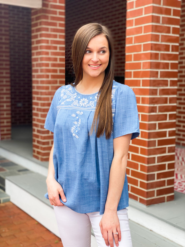 Light blue embroidered blouse